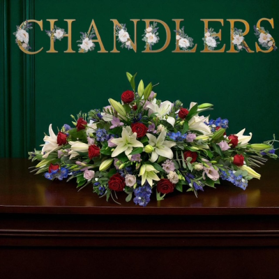 Red White Blue And Lilac Casket Spray - Beautiful Casket Spray Of White Lilies, Red Roses, Blue Delphiniums And Lilac Lizianthus And Freesia